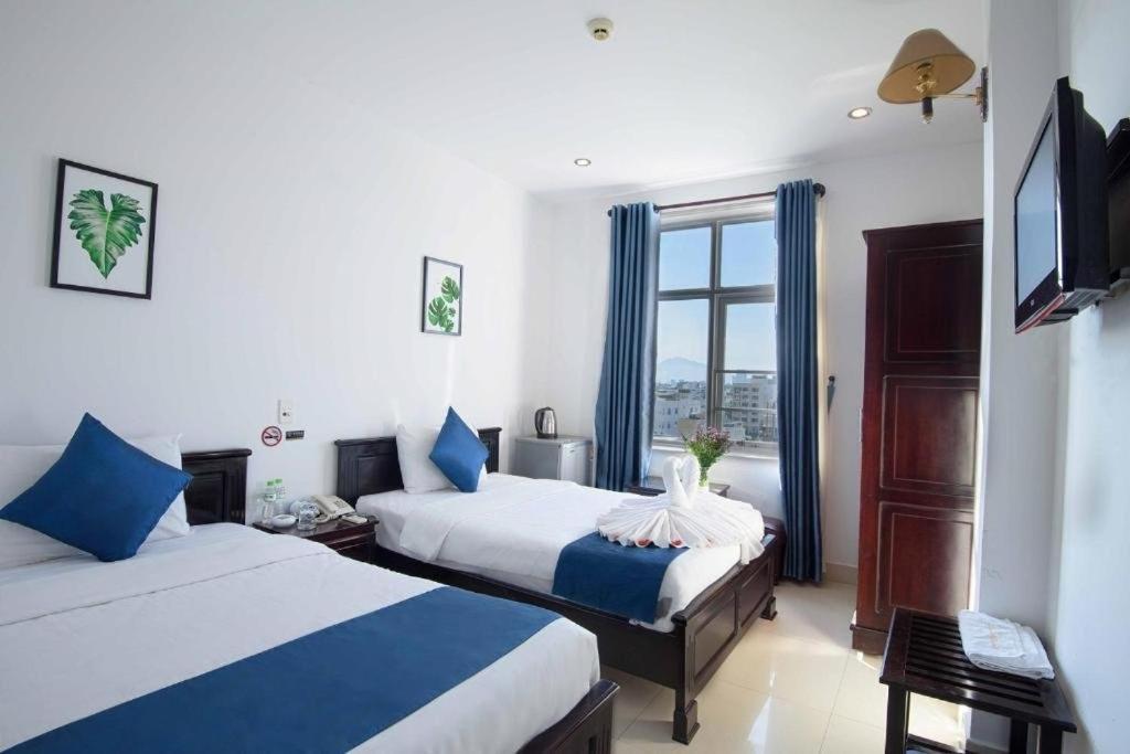 Tehana Beach Hotel Da Nang Bagian luar foto